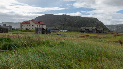 Houses in the village of Teriberka on the Barents sea coast, Russia, August 2020