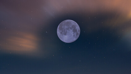 Obraz na płótnie Canvas Beautiful full moon on the starry sky and clouds.