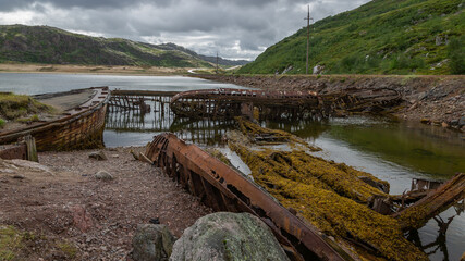 Cemetery of old ships in the village of Teriberka, Barents sea, Russia, August 2020