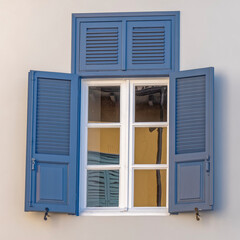 vintage blue shutters with white frame window, architectural detail