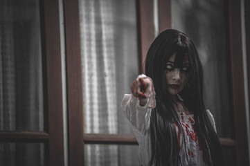 Portrait of asian woman make up ghost,Scary horror scene for background,Halloween festival...