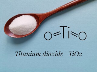 Structural chemical formula of titanium dioxide molecule with white titanium dioxide (TiO2) powder...