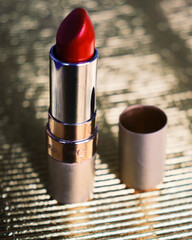 Red lipstick in golden environment