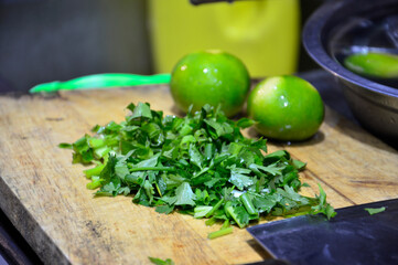 The vegetables were cut into small pieces on the cutting board.