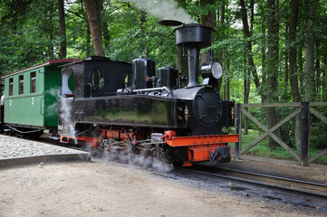 Fototapeta premium Old black steam locomotive is waiting for passengers. Ventspils, Latvia.