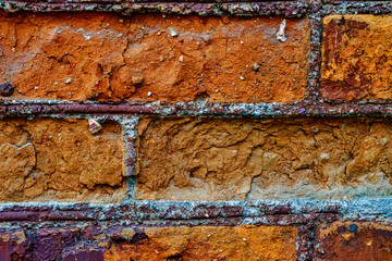 Orange brick wall in details. Macro shot.