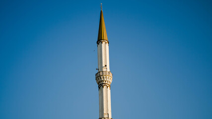 Minaret tower on the blue sky in Ankara