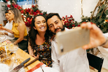 Christmas in Brazil. Family celebrating Christmas dinner in the yard.