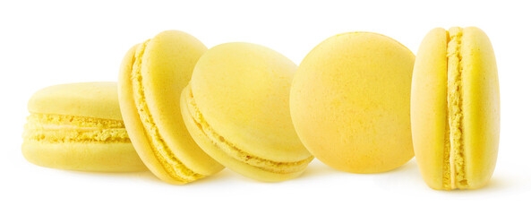 Five yellow (lemon or banana) macaroons in a row isolated on white background