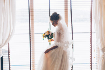 Gathering of the bride at the hotel in the apartment