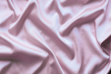 Obraz premium Smooth elegant pink silk with soft folds can be used as background