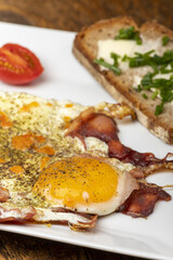 two eggs sunny side up on a plate