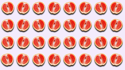 Fruit pattern of half a grapefruit with a shadow on a light background.