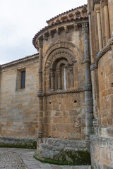 Fototapeta na wymiar Vertical detail of the rear of the 12th century Collegiate Church, in Santillana del Mar, Spain, October 1, 2020