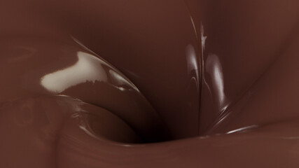 Detail of pouring hot chcocolate with splash