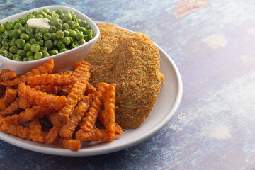 Meal of Breaded Fish Sweet Potato Fries and Peas