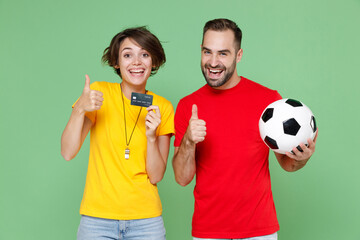 Excited couple friends sport family woman man football fans in t-shirts cheer up support favorite...