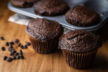 jumbo chocolate muffin on wooden background