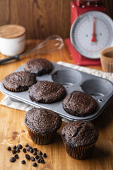 jumbo chocolate muffin on wooden background