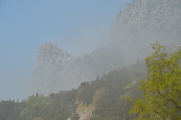 Clouds descended into the valley between the mountains. Crimea. Horus Cat.