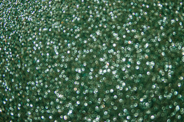 Unframed abstract background green glitter. sparkles