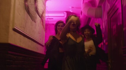 happy girls come to a club party