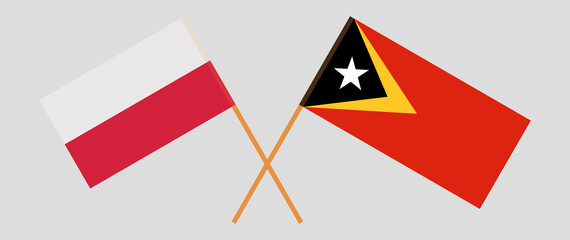 Crossed flags of East Timor and Poland