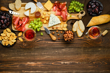 Top view of cheese plate and snack for wine