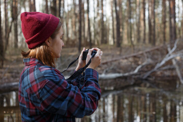 beautiful stylish girl in the forest