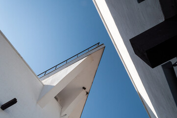 Architecture - details and elements. Details of the building against the blue sky. Urban structures.