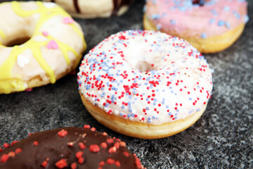 donuts in different glazes with chocolate