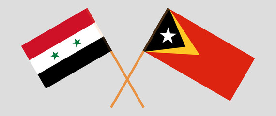 Crossed flags of East Timor and Syria