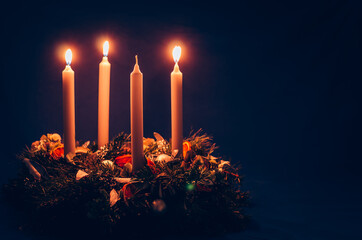 3. advent candle burning on advent wreath