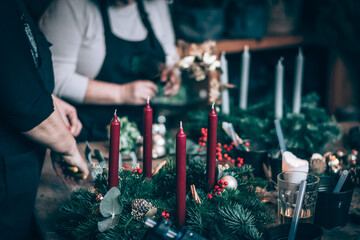preparation and creation of christmas advent wreath from natural components