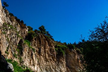 Stones on the slopes of the Avakas mountain gorge on the island of Cyprus.