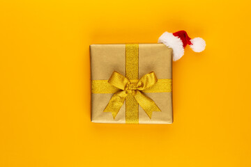 Christmas, holiday present box on red background.