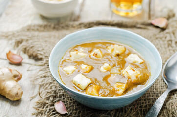 Saag Paneerin a bowl on a wood background