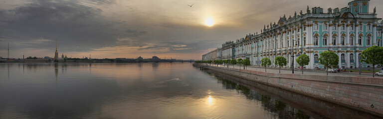 Fototapeta na wymiar Panorama of the Hermitage and Palace embankment at dawn in Saint Petersburg