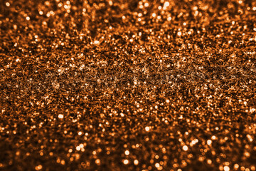 Gold glitter texture  sparkling shiny background for Christmas holiday wallpaper decoration, greeting and wedding invitation card design element, Xmas abstract background with copy space