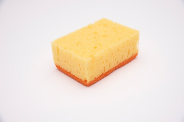 yellow dishwashing sponge on white background