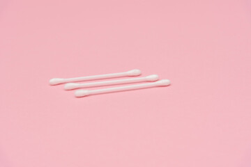 ear sticks on a pink background