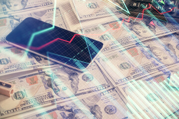 Double exposure of forex graph drawing over us dollars bill background. Concept of financial markets.
