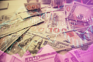 Multi exposure of forex chart drawing over us dollars bill background. Concept of financial success markets.