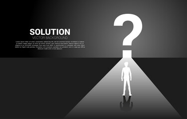 Find the solution concept. Silhouette of businessman running to question mark icon with lighting