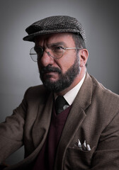 Fototapeta premium Vintage man looking the horizon using beard and glasses