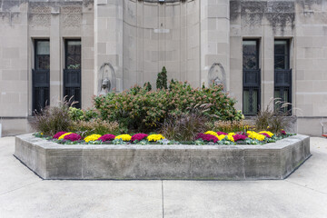 Flower garden in front of vintage architecture in urban setting of downtown Chicago