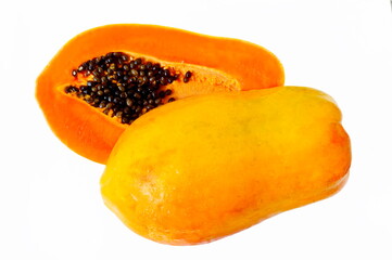 Papaya. Homeland Central America.
The picture shows a cut fruit.
White background.