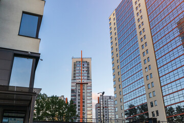 Obraz premium building in the style of modern architecture high-tech cityscape mirrored facade apartment