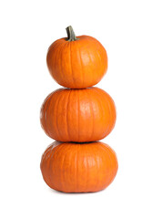 Beautiful ripe orange pumpkins on white background