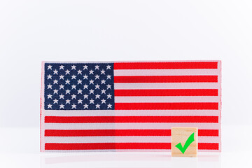 Voting concept, November 3 - US Election Day. Flag and sign on white background.